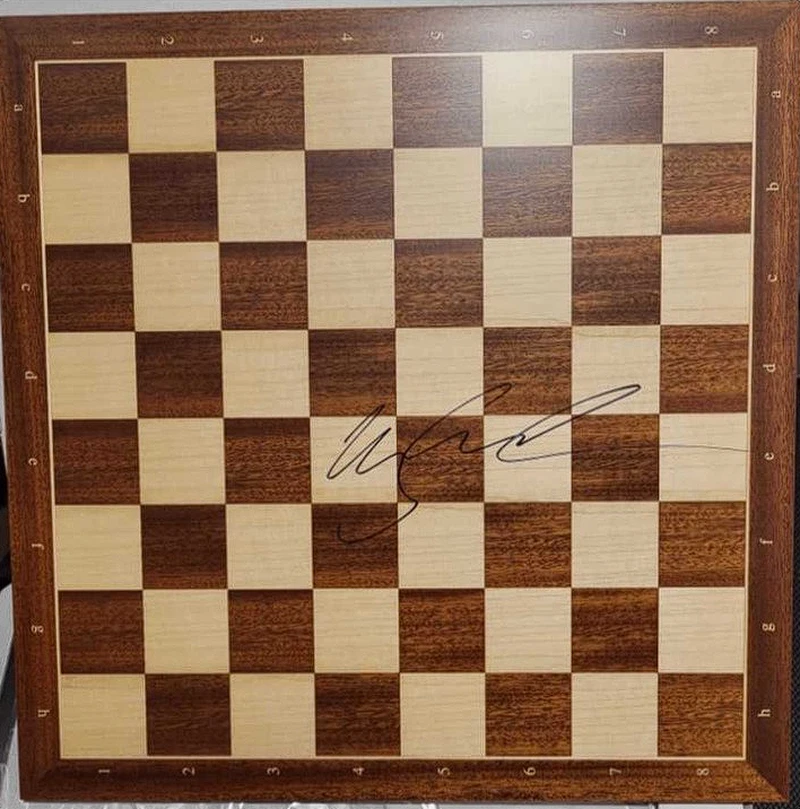 Chessboard signed by Magnus Carlsen