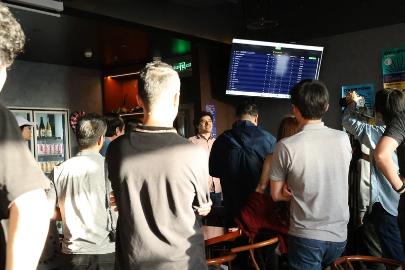 Players checking the final standings