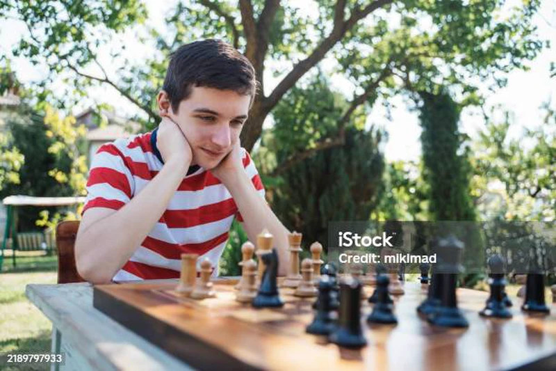 Chess player thinking (credit: mikimad)