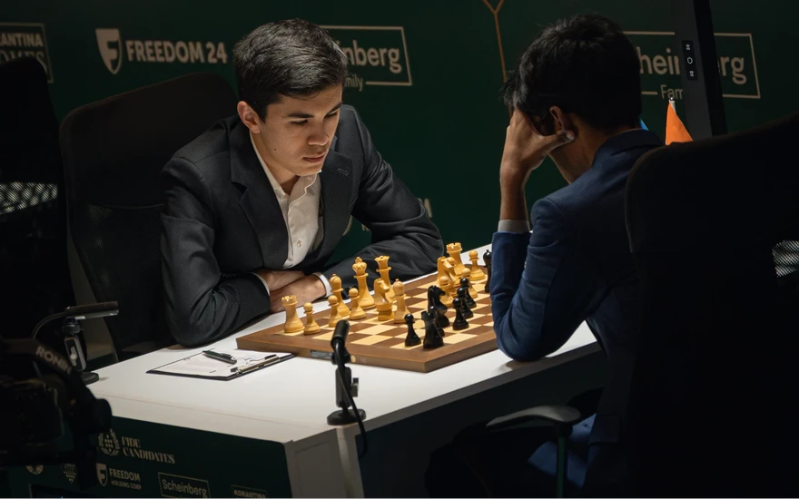GM Vaishali Rameshbabu, playing Black, thinks about her
Save into
Candidates Round 10: Sindarov Widens Gap Once Again, Vaishali in Sole Lead
![