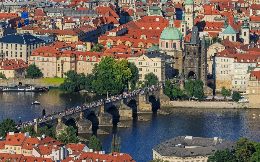 A collection of some updates throughout the first three quarters of 2026, including the sign-in page redesign, the broadcast widget, piece relationship aids, and a new homepage game carousel
Save into
Lichess Meetup: Prague
![An aerial view of Prague