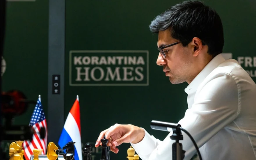 GM Anish Giri playing a move as Black