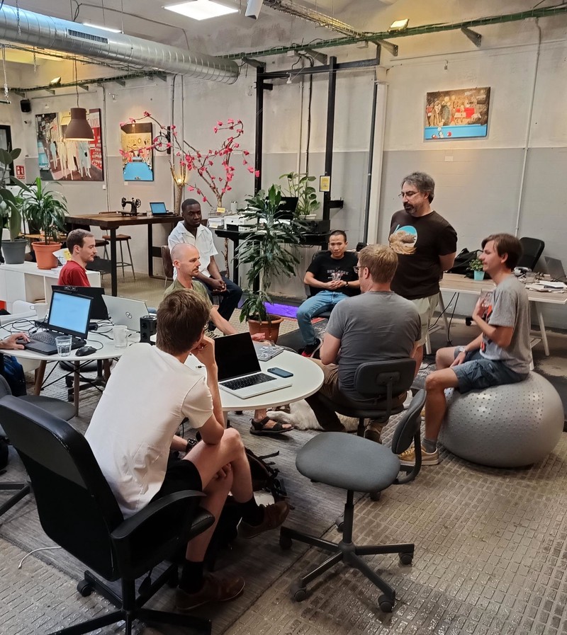 Lichess developers in a deep discussion during the Barcelona meetup (September 2023).