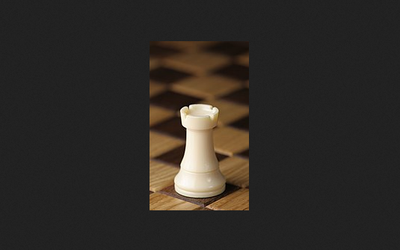A white rook on a chessboard