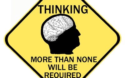 Sign saying "Thinking. More than none will be required."
