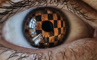 A chessboard reflected in a human eye