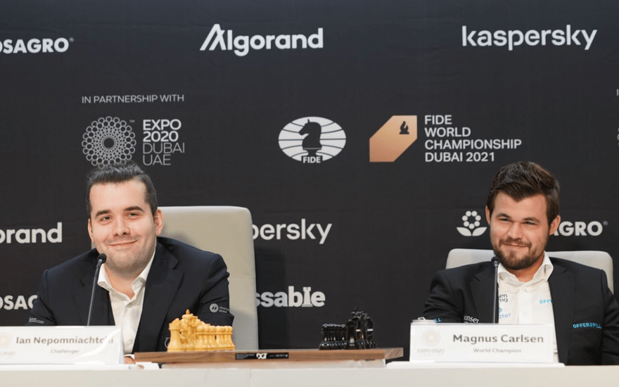 Magnus and Nepo sitting down at the 'press conference' / opening ceremony.